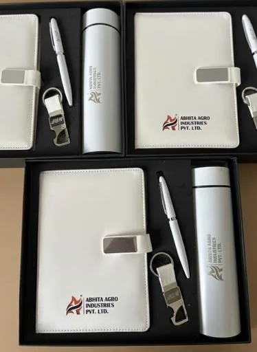 White joiner kits with diary, pen, bottle and keychain branded for Abhita Agro Industries