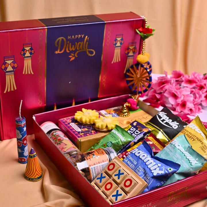 Celebration Gala Hamper, a Diwali gift hamper with Happilo Nutmix, Happilo Dryfruit Sweets and Madmix Bhujiya