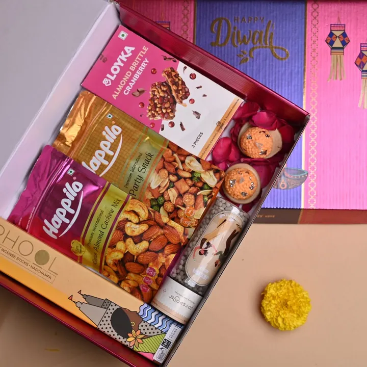 The Classic Festivity Hamper, a Diwali gift hamper with Happilo Cajun Almond Cashew Mix, Happilo Party Snack and Loyka Almond Brittle