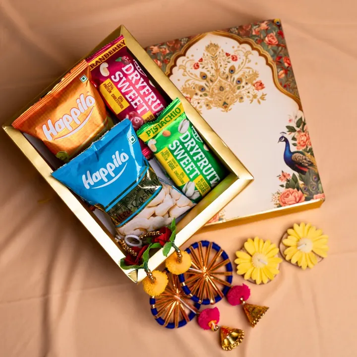 Delightful Bites Hamper, a Diwali gift hamper with Happilo Salted Cashews, Happilo Party Snack and Happilo Dryfruit Sweets